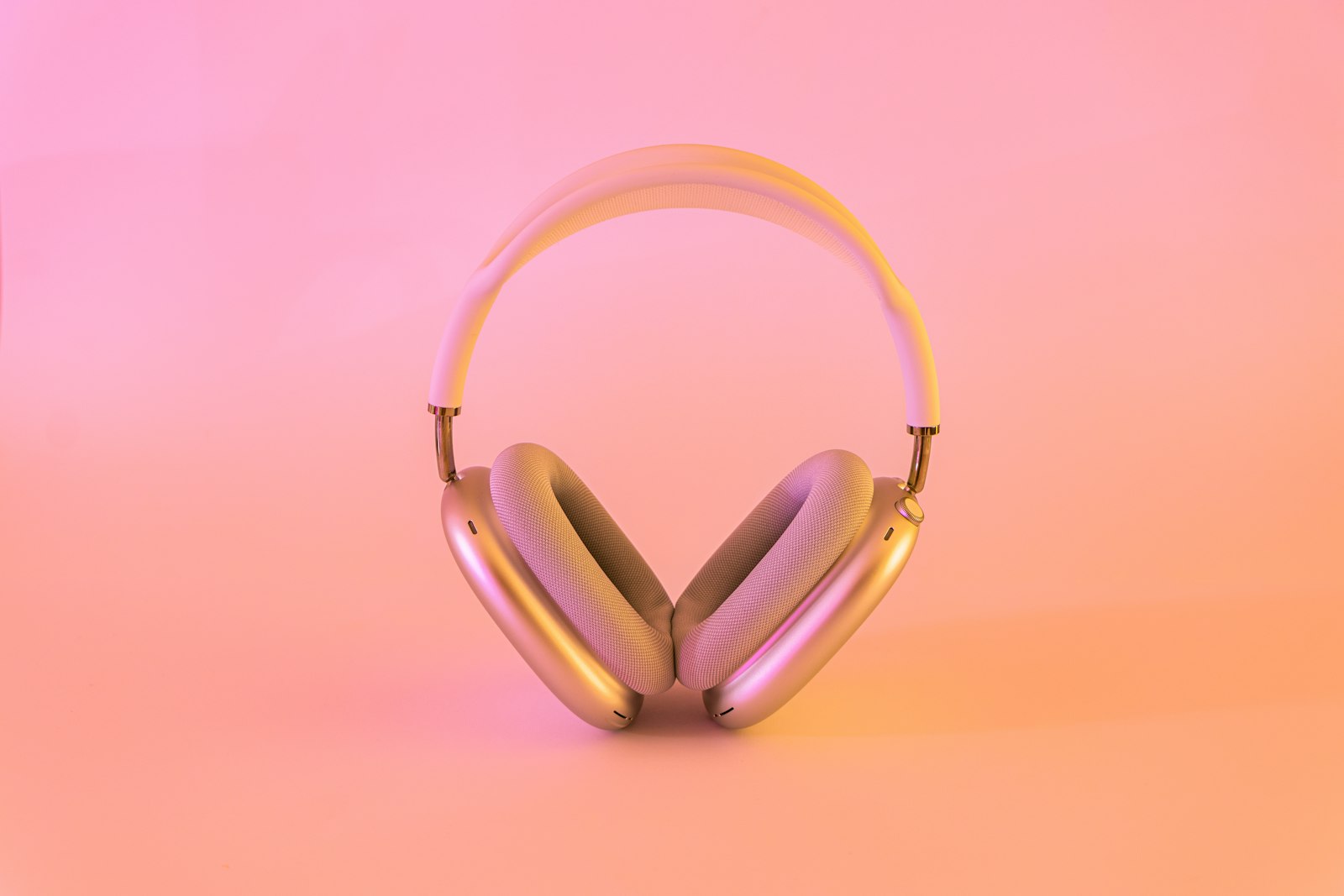 Light mesh-style pads on silver headphones